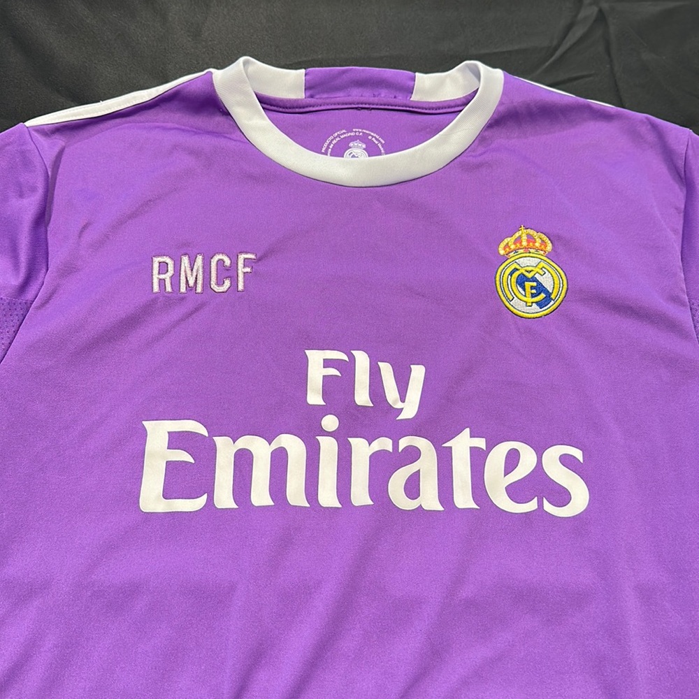 Ronaldo Real Madrid purple jersey men’s XL bought in Spain before a game.